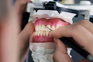 Lab technician working to create dentures