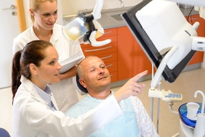 Patient learning about his candidacy for All-on-4 treatment