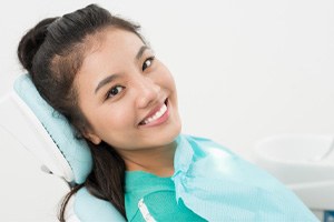 Happy dental patient enjoying the benefits of root canal therapy