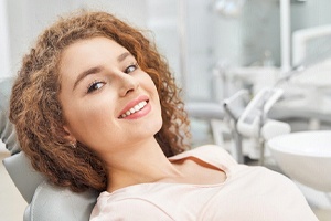 Young woman at appointment for cosmetic dentistry service