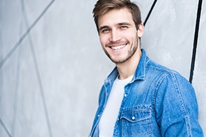 Smiling man enjoying the benefits of tooth-colored fillings