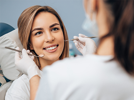 Woman receiving dental treatment