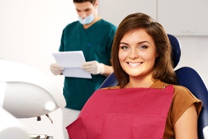 Female patient smiling after successful gum disease treatment