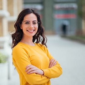 Woman enjoying new confidence after her smile makeover in Needham