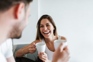 Young couple enjoying coffee together